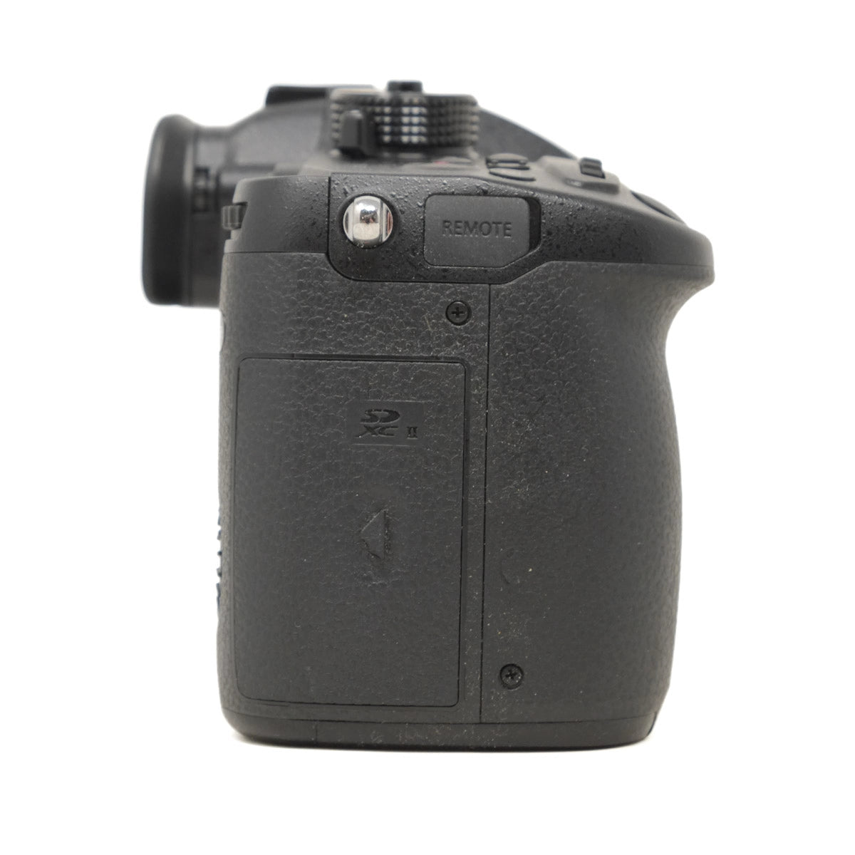 Black camera body on a white background