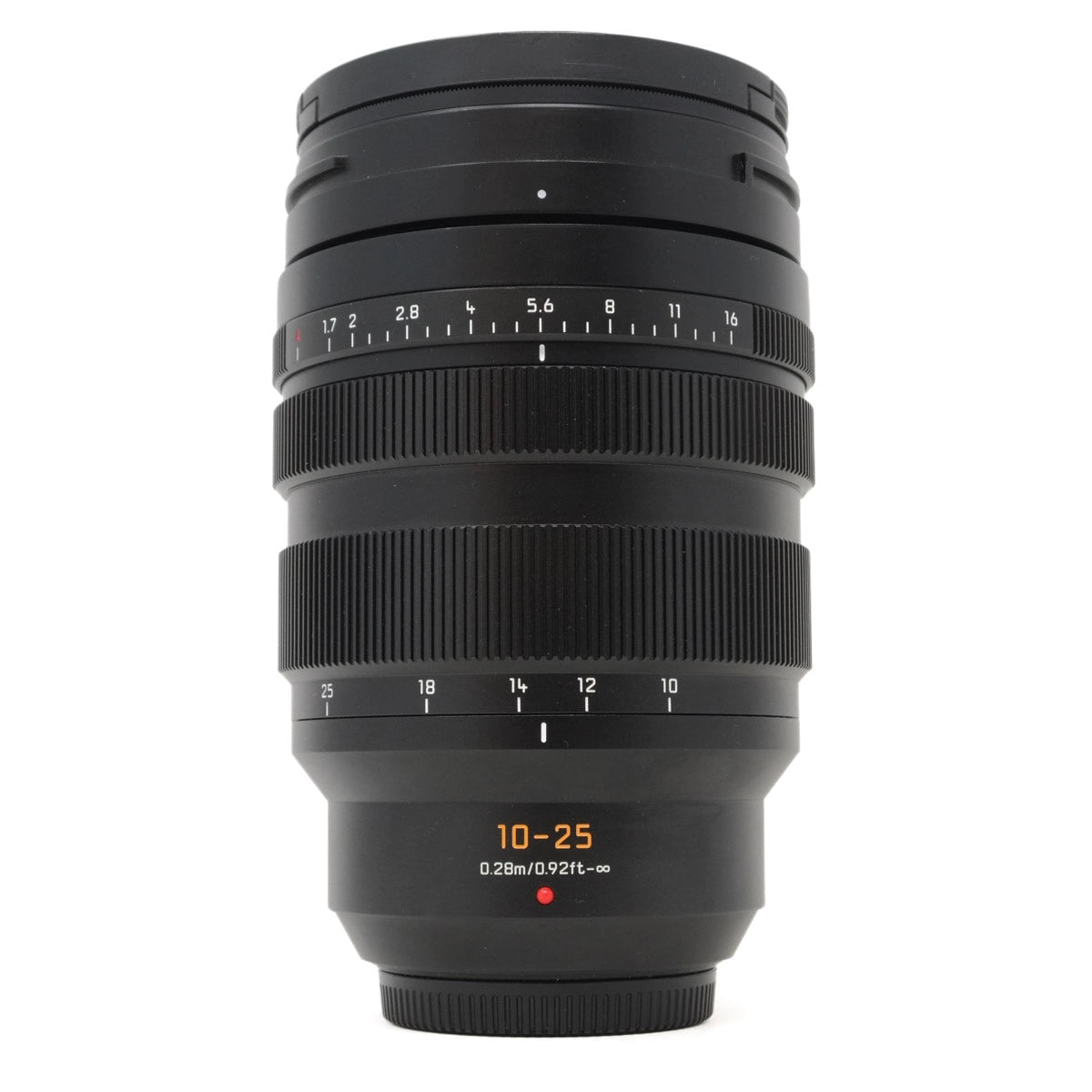 Black camera lens with focus scale on a white background