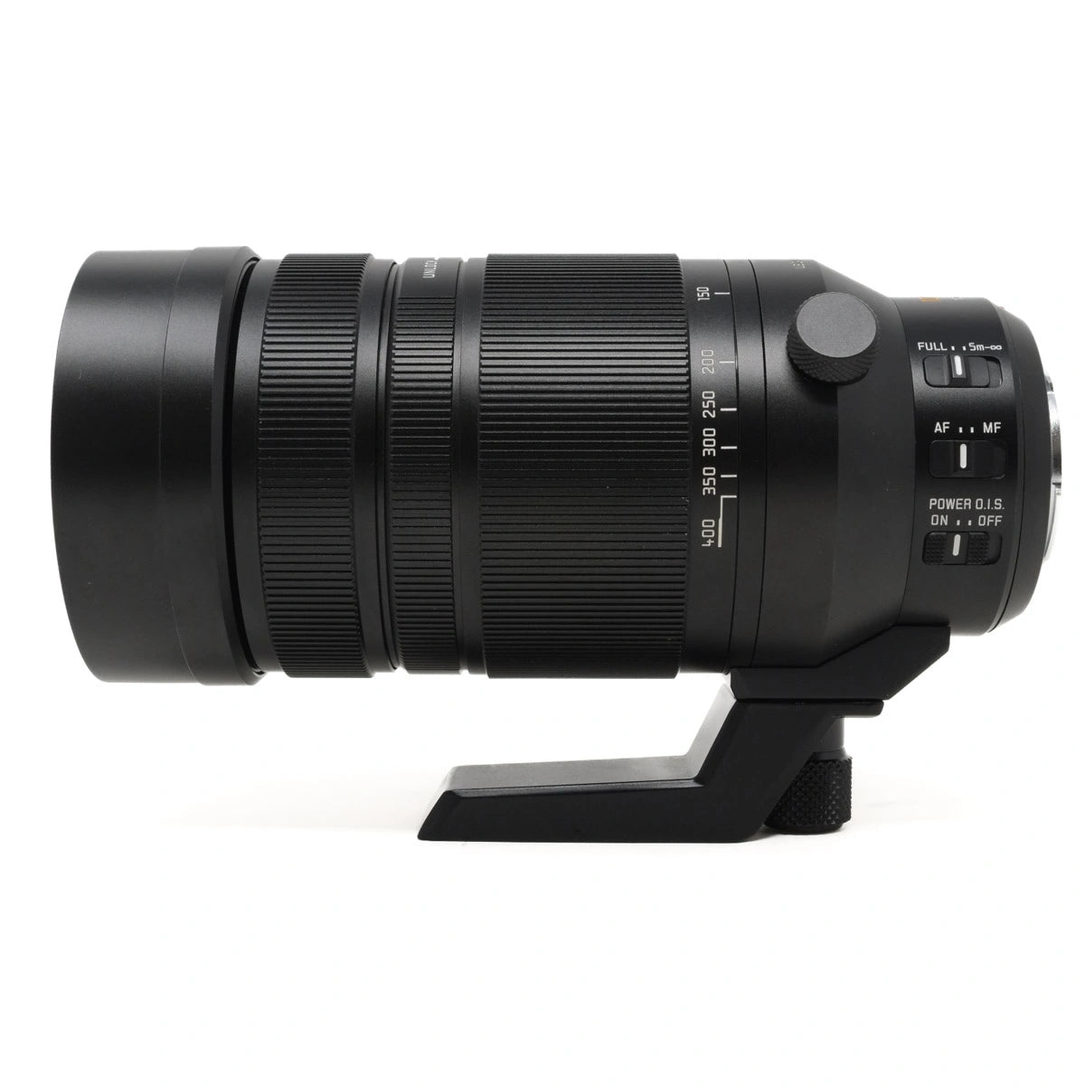 Camera lens with control buttons on a white background