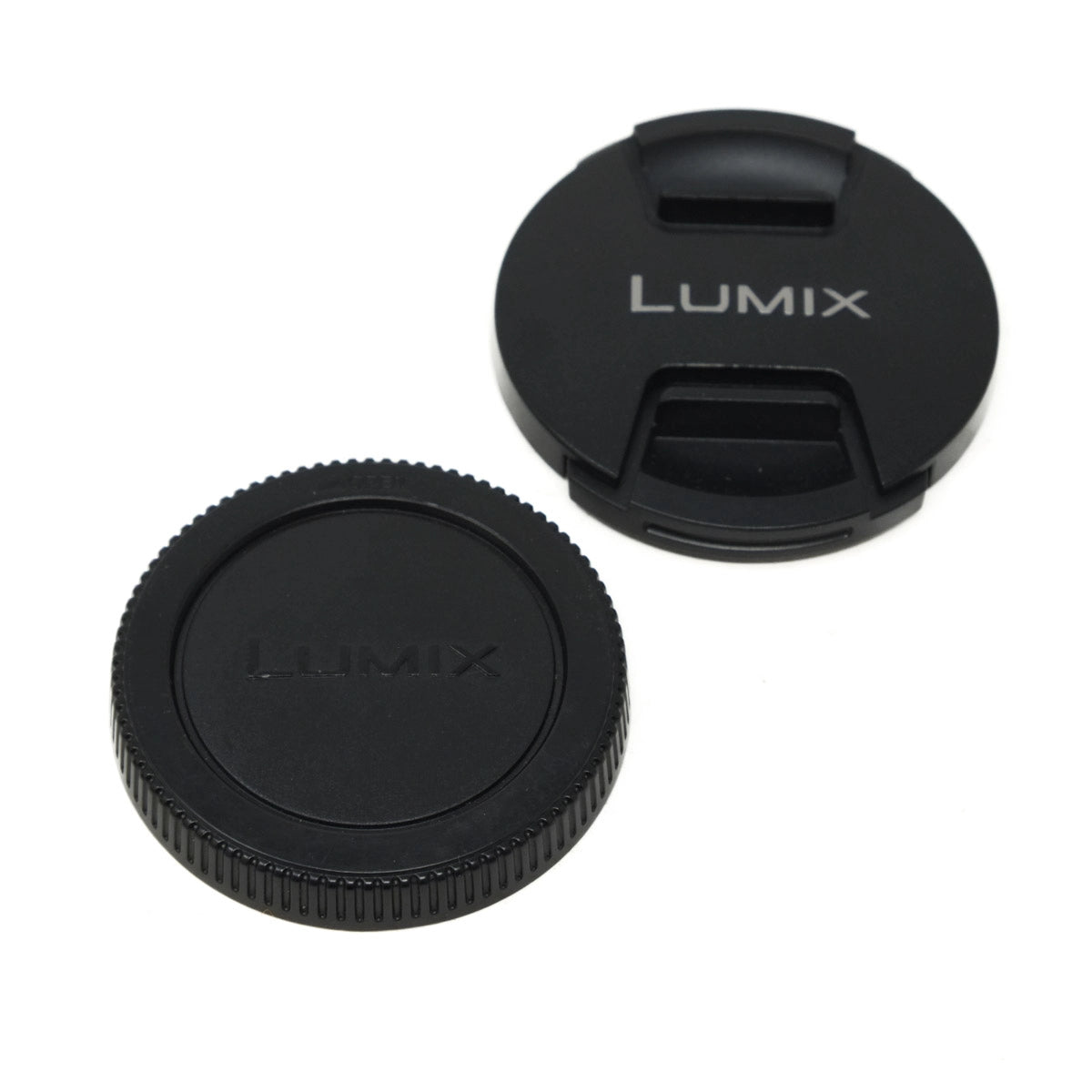 Two black camera lens caps with 'LUMIX' branding on a white background