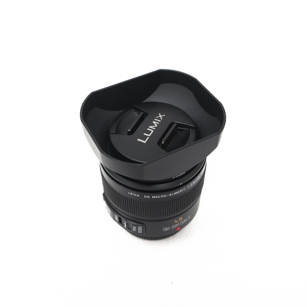 Used Panasonic Lumix 45mm F2.8 ASPH Macro Lens - Top angle with lens cap and hood 