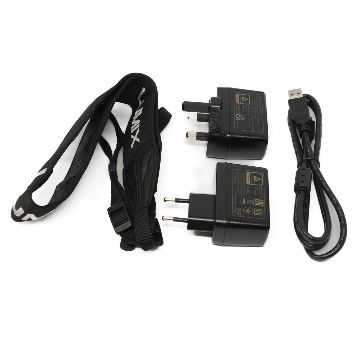 Set of electronic accessories including a neck strap, power adapter, and USB cable on a white background.