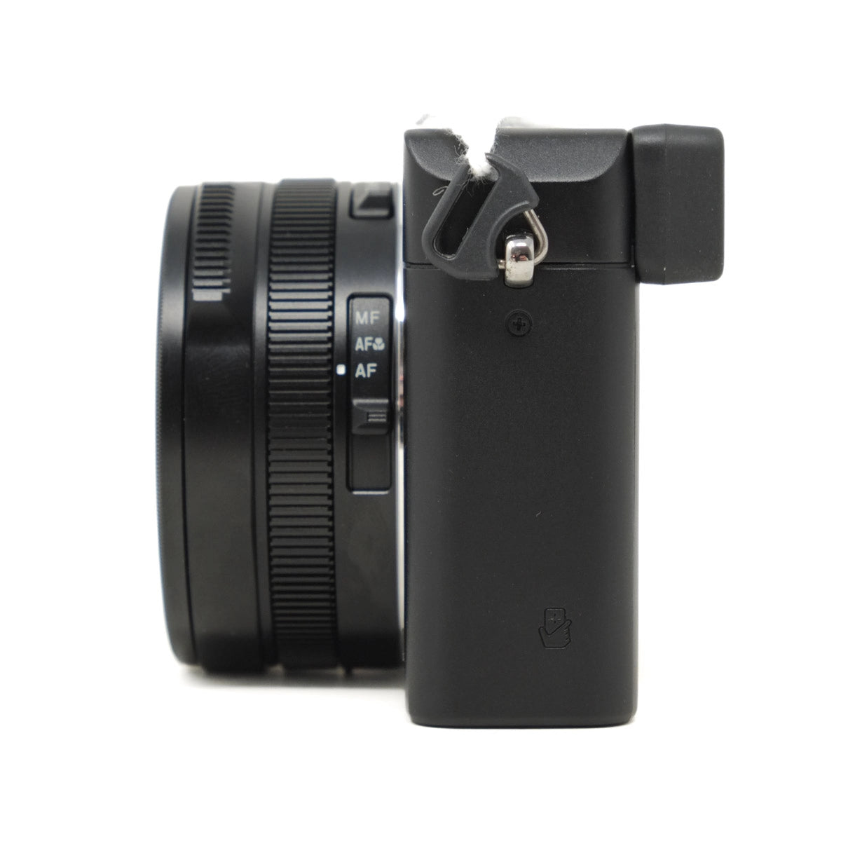 Black camera lens and body on a white background