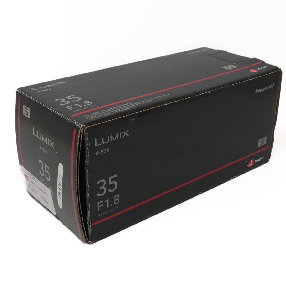 Black Lumix camera lens box with red accents on a white background