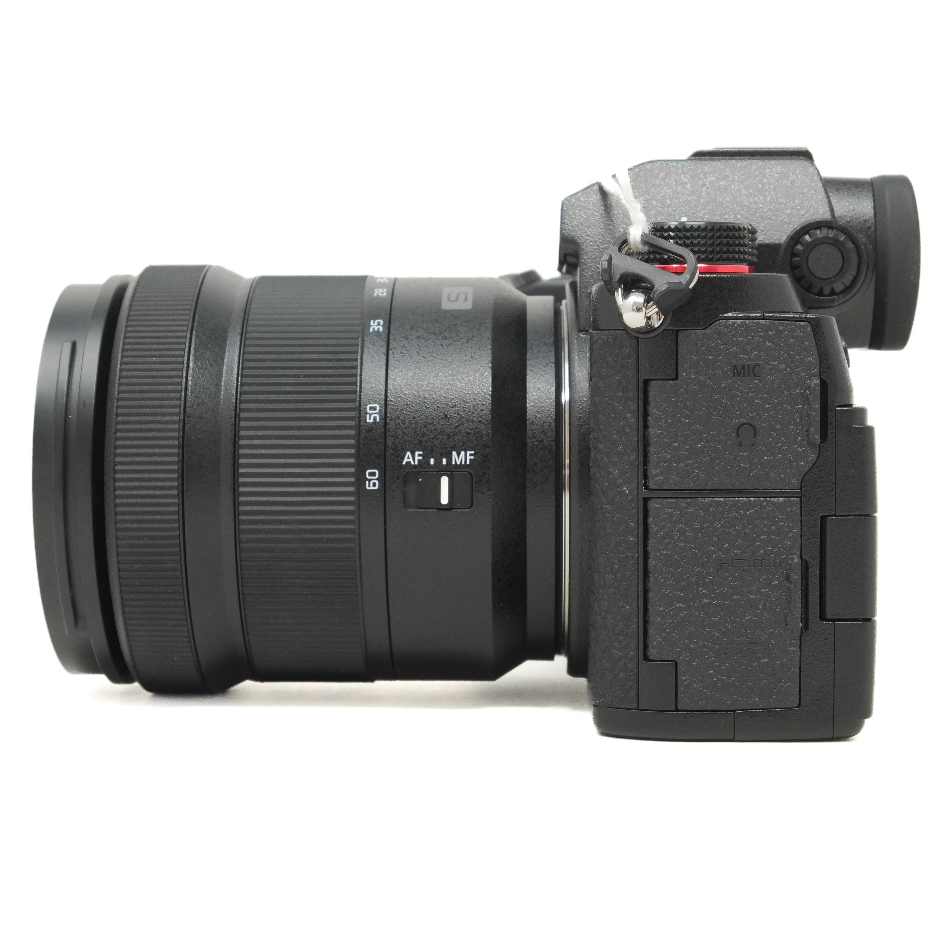 Camera with lens on a white background