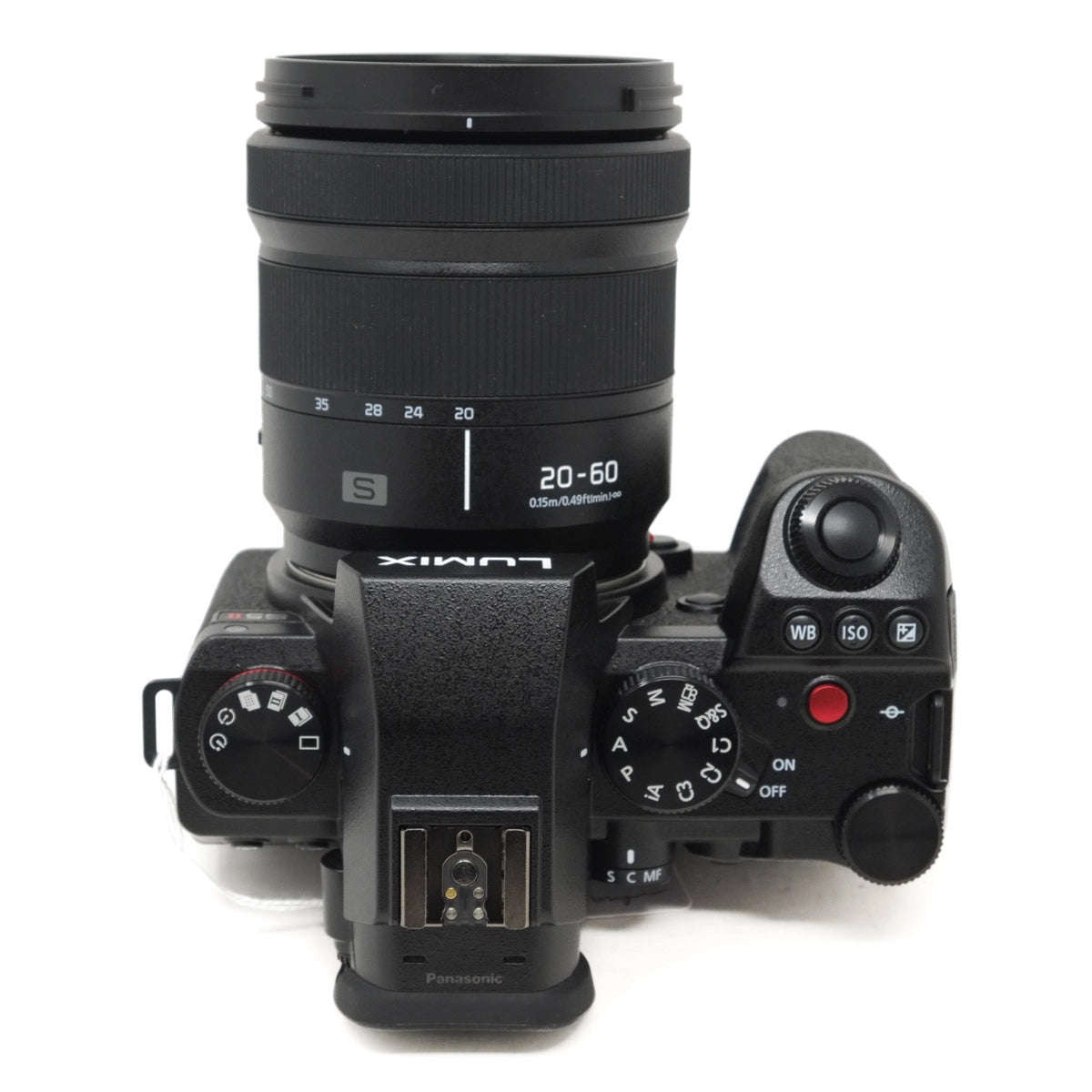 Camera with a lens on a white background