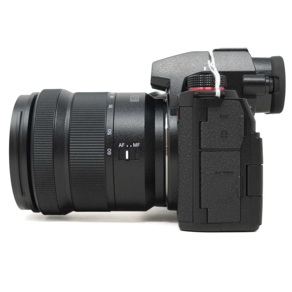 Camera lens and body on a white background