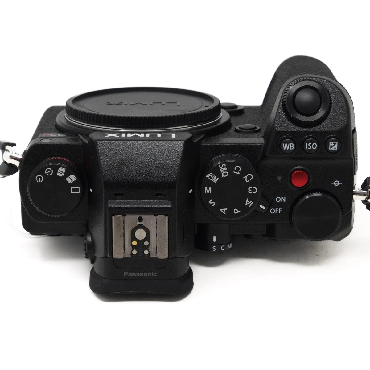 Camera body with control dials and buttons on a white background