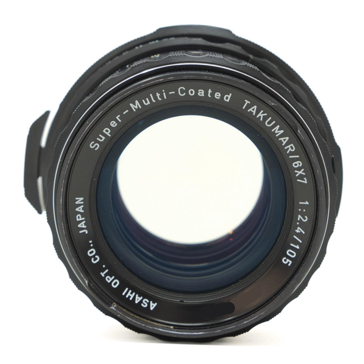 Camera lens with 'Super-Multi-Coated TAKUMAR' text on a white background