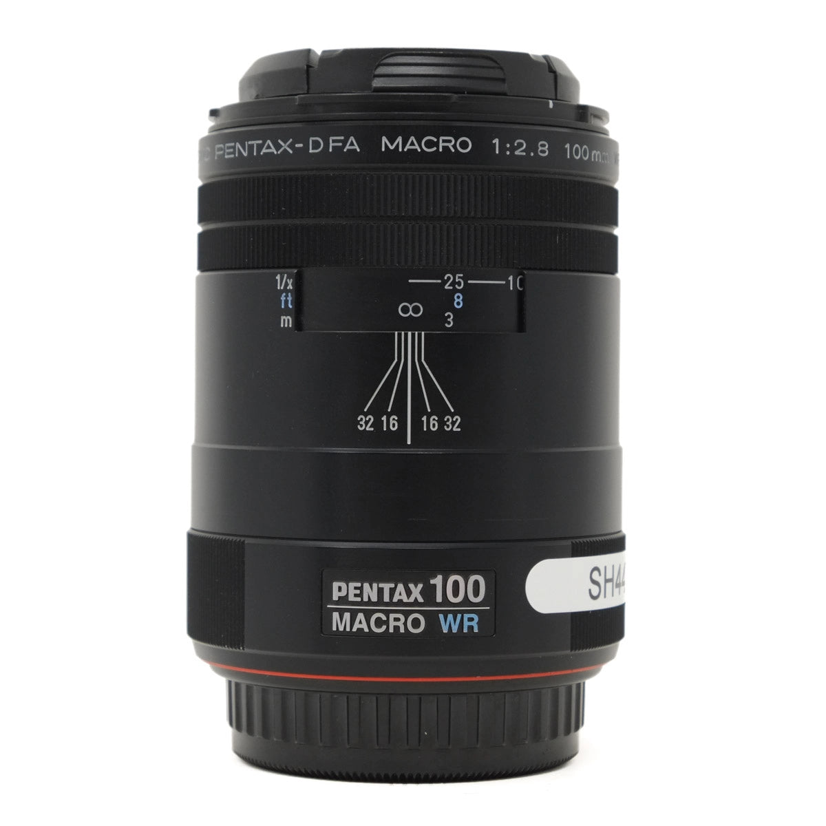 Pentax 100mm macro lens on a white background