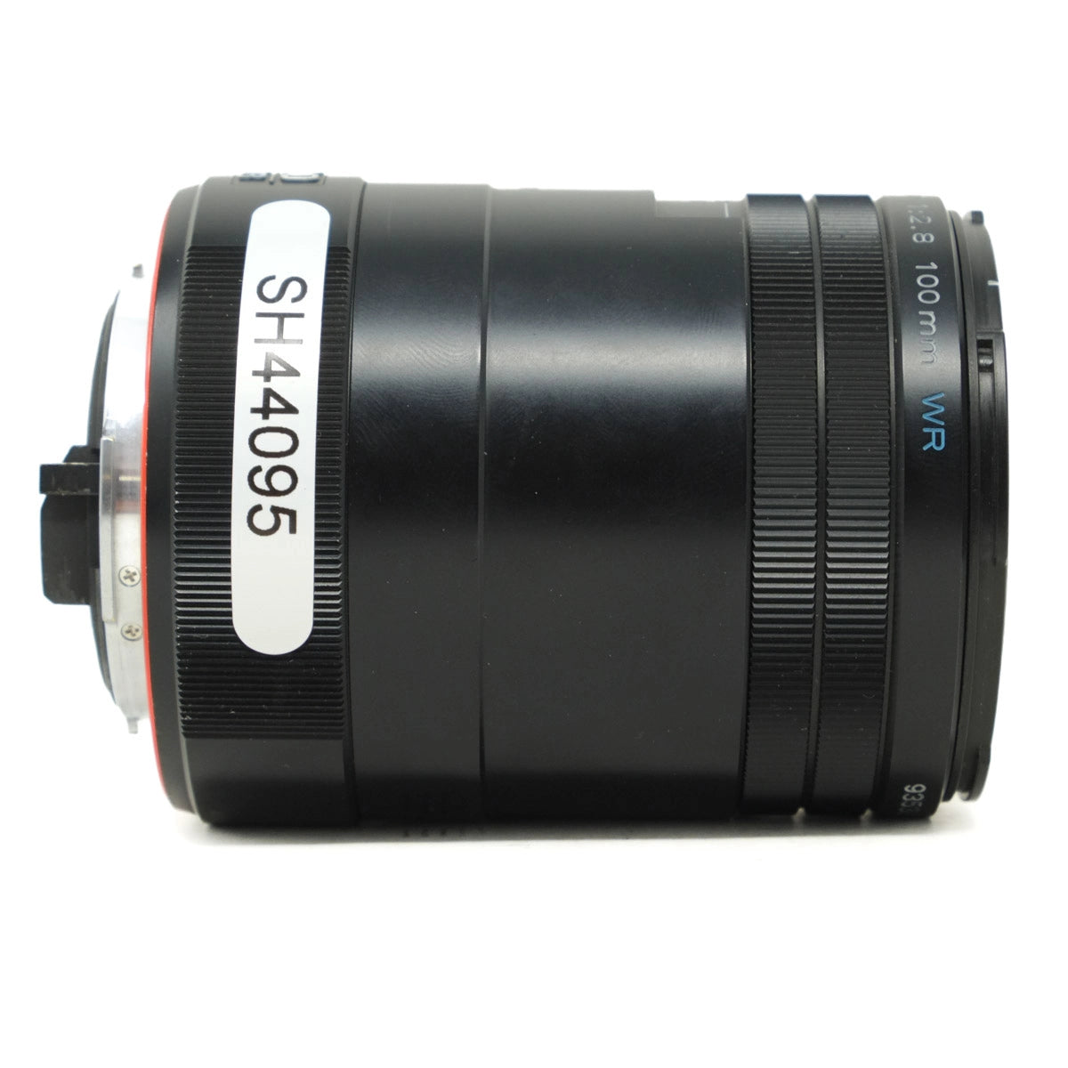 Camera lens with 'SH44095' marking on a white background