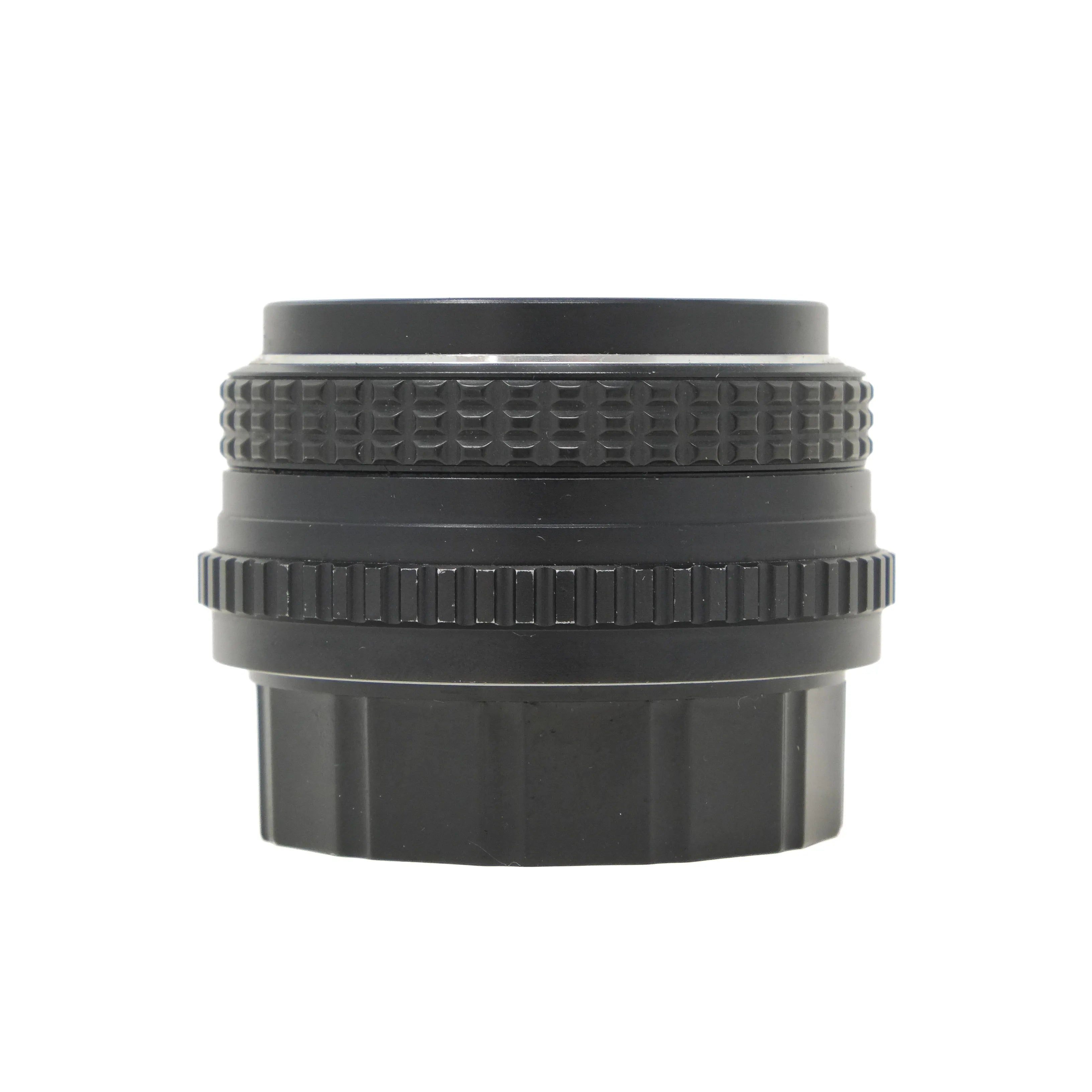 Black camera lens on a white background