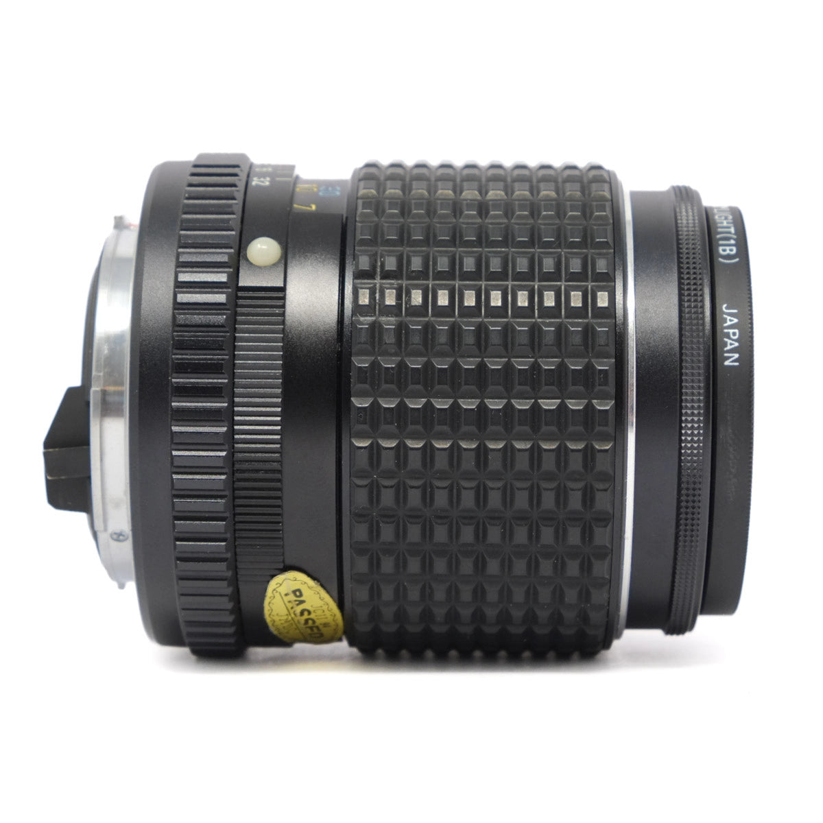 Close-up of a camera lens on a white background