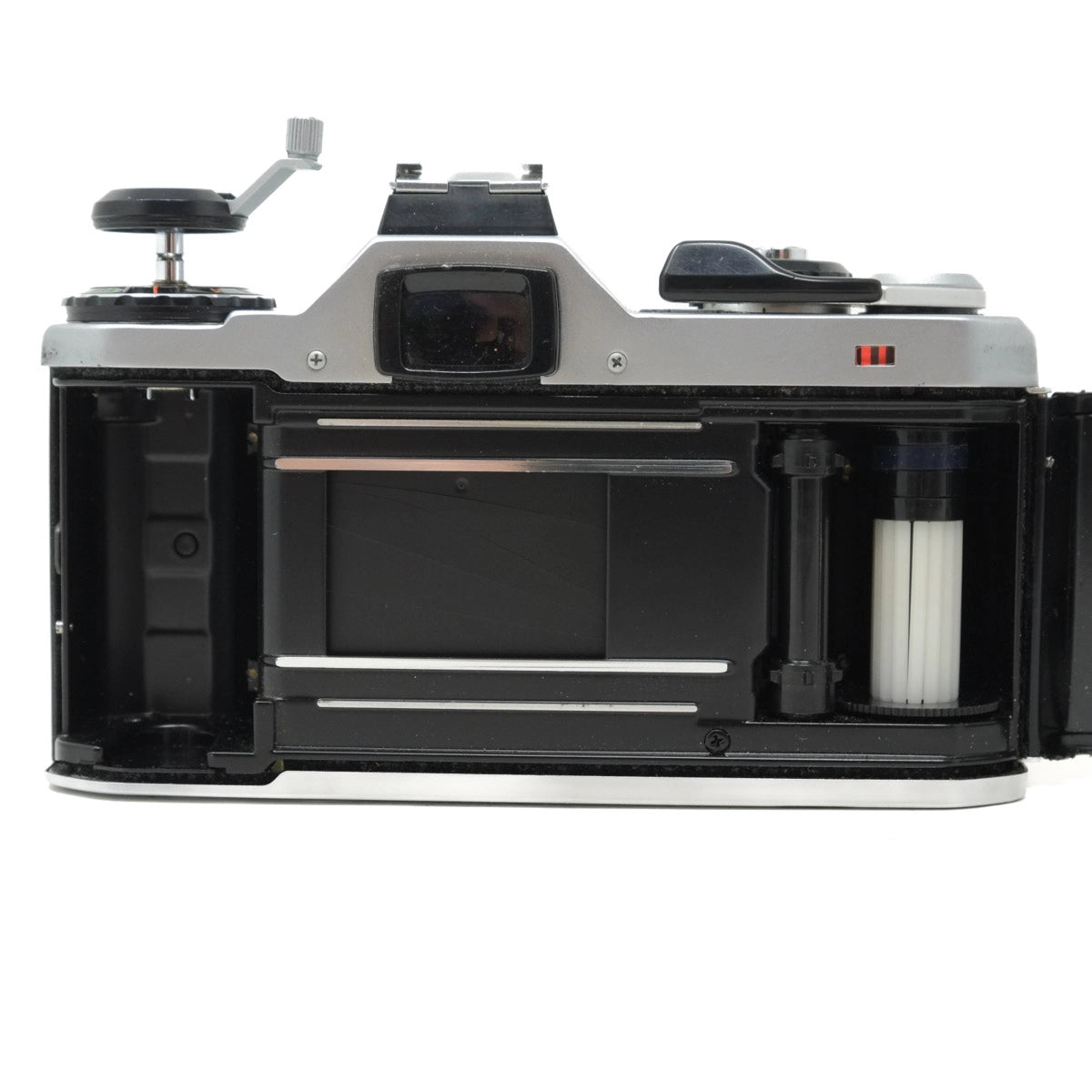 Open camera body showing internal components on a white background