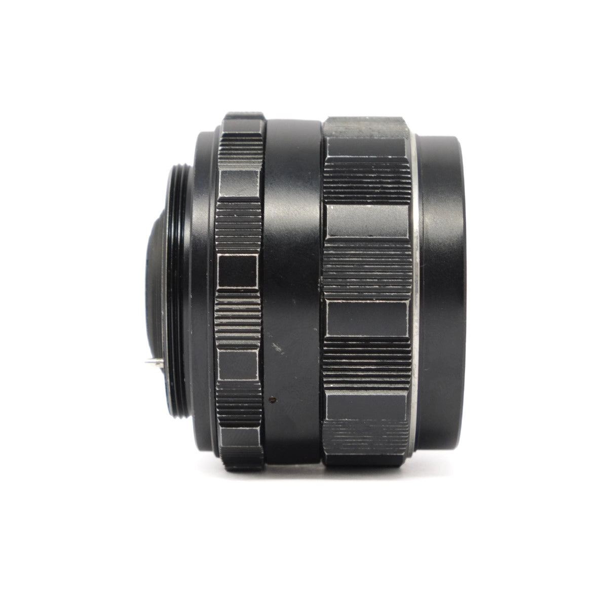 Black camera lens on a white background