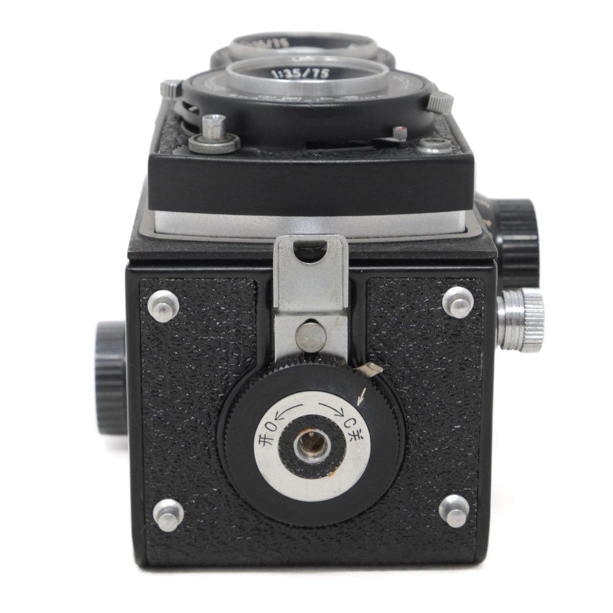 Vintage camera with black body and silver components on a white background