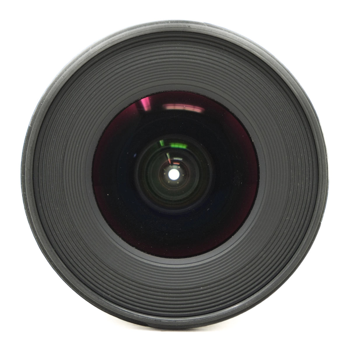 Close-up of a camera lens on a white background