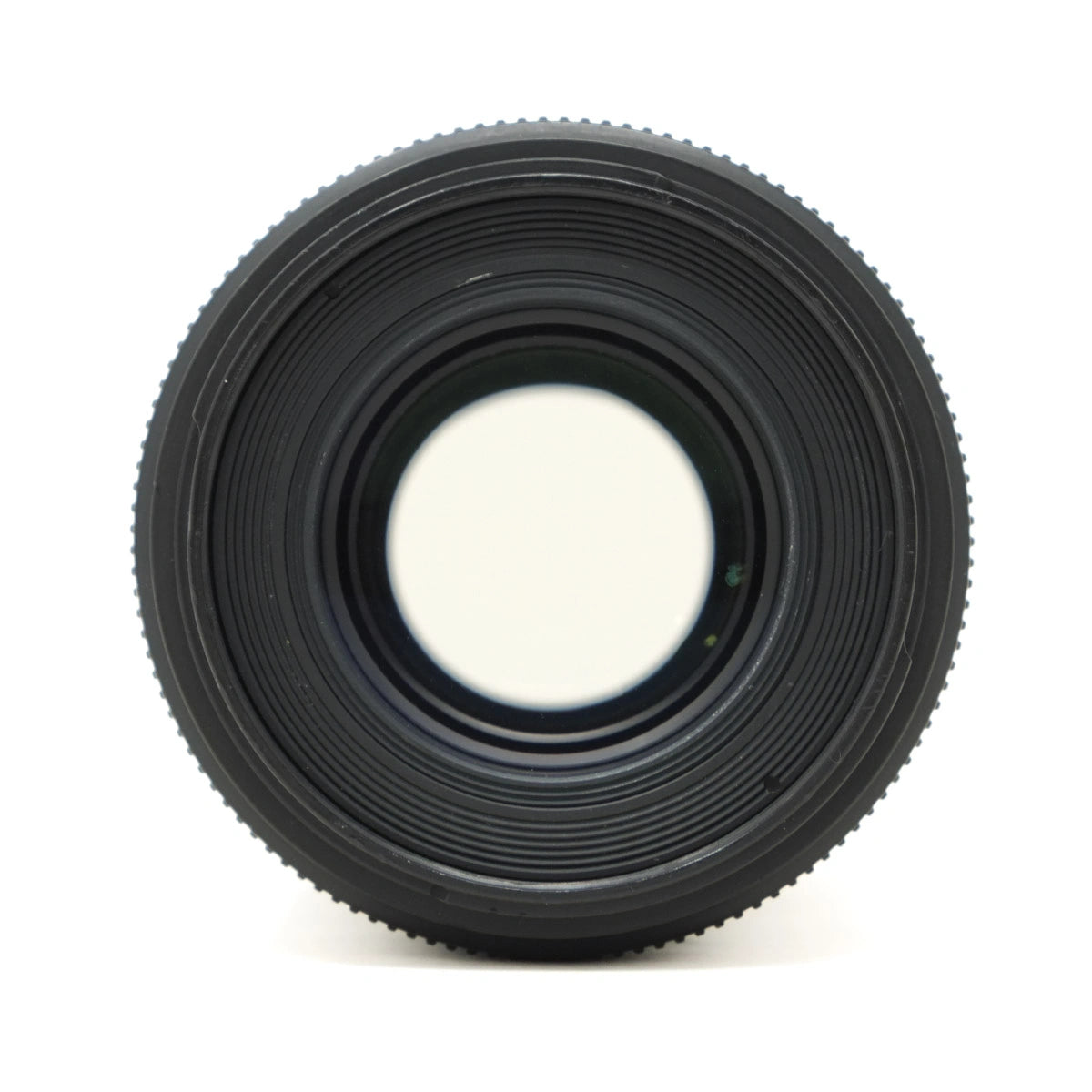 Black camera lens on a white background