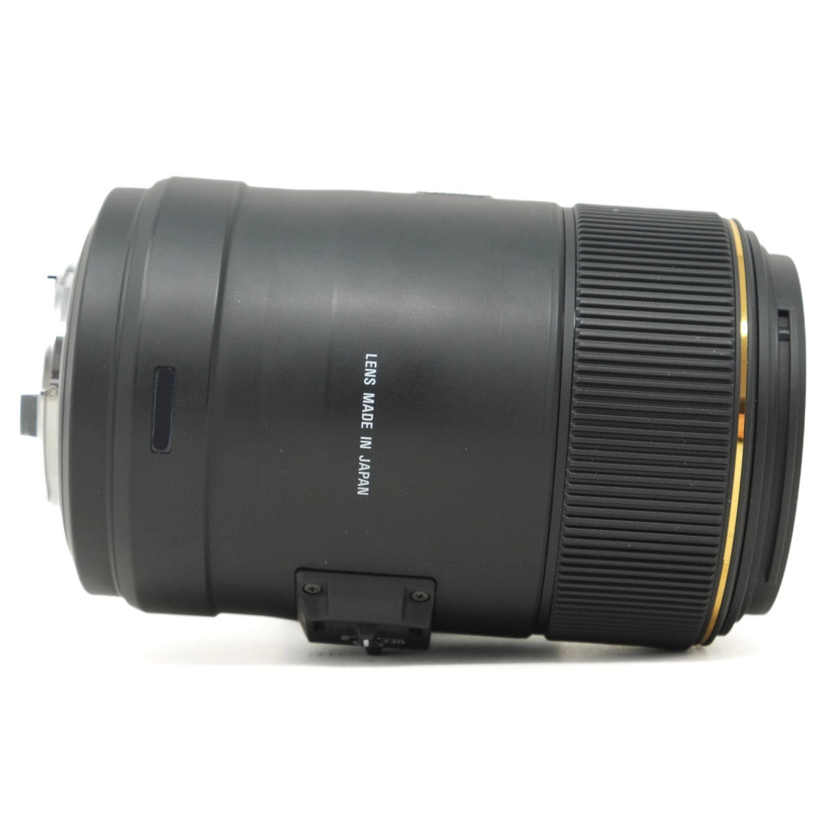 Camera lens with 'Made in Japan' text on a white background