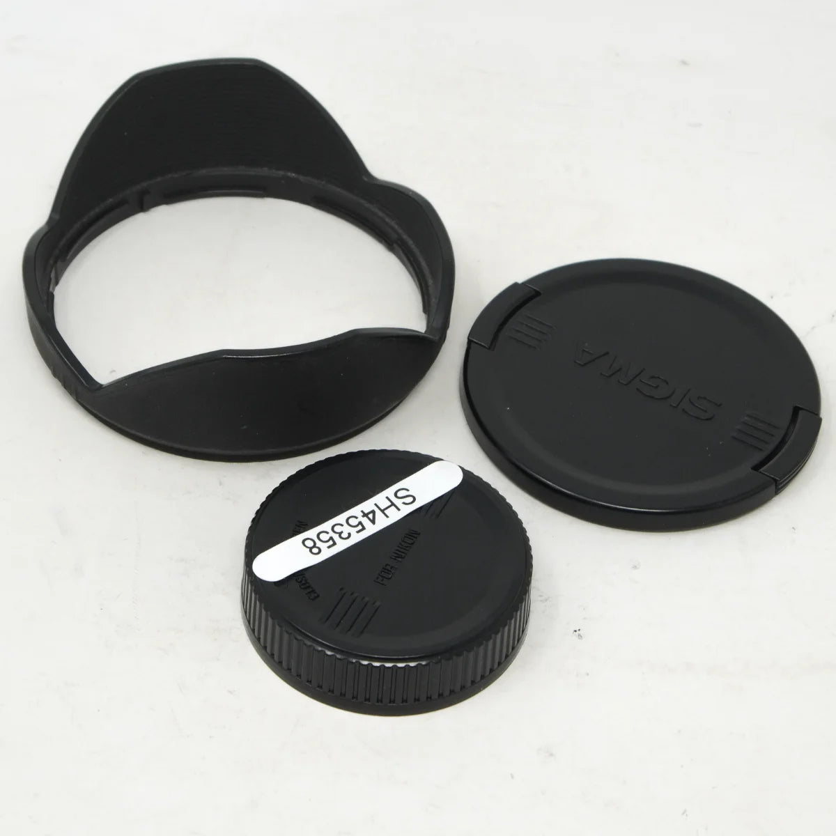 Used Sigma 17-35mm F2.8-4 DG HSM wide angle lens - lens hood and caps 