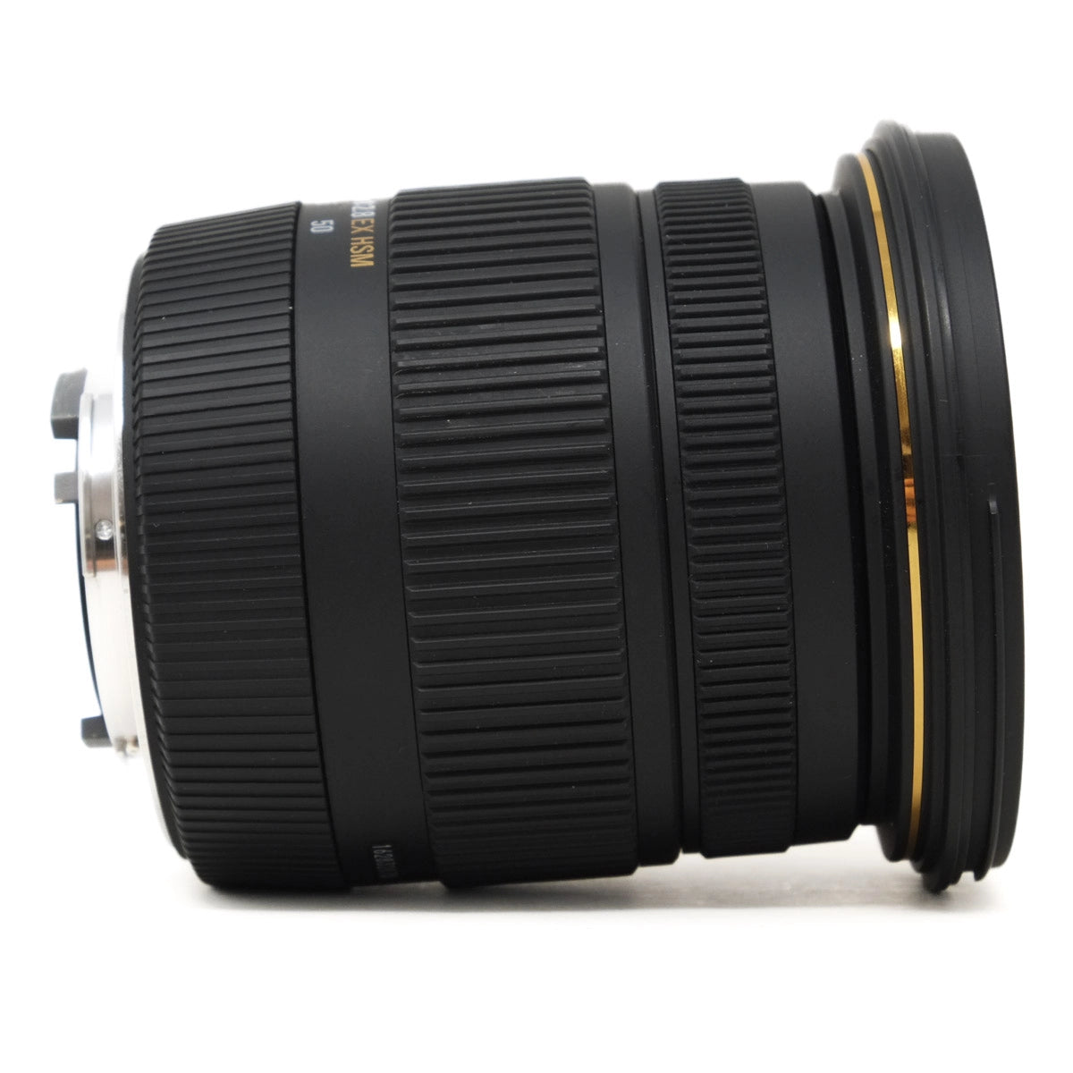 Camera lens with Nikon branding on a white background