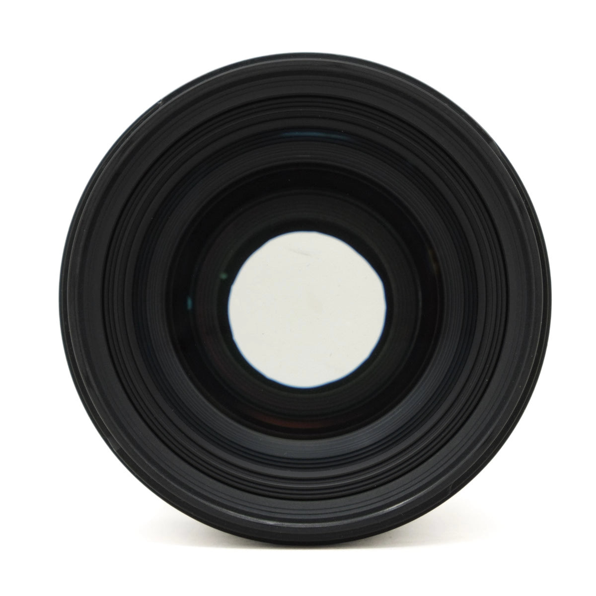 Close-up of a camera lens on a white background