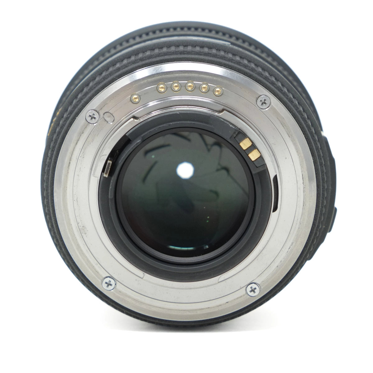 Close-up of a camera lens on a white background