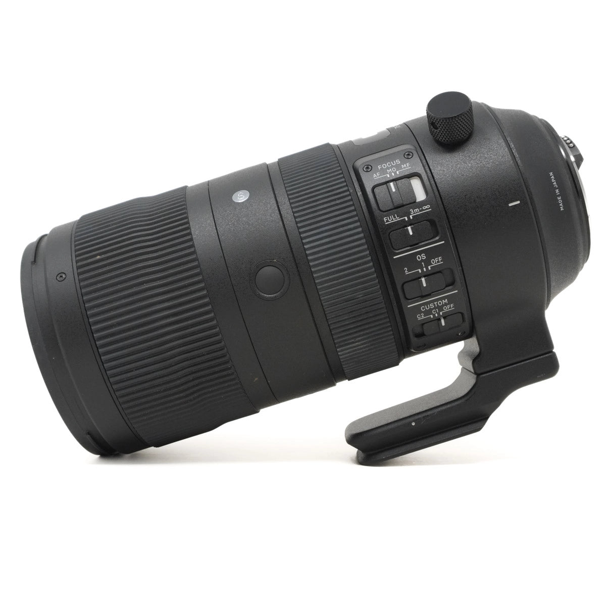 Camera lens with control buttons on a white background