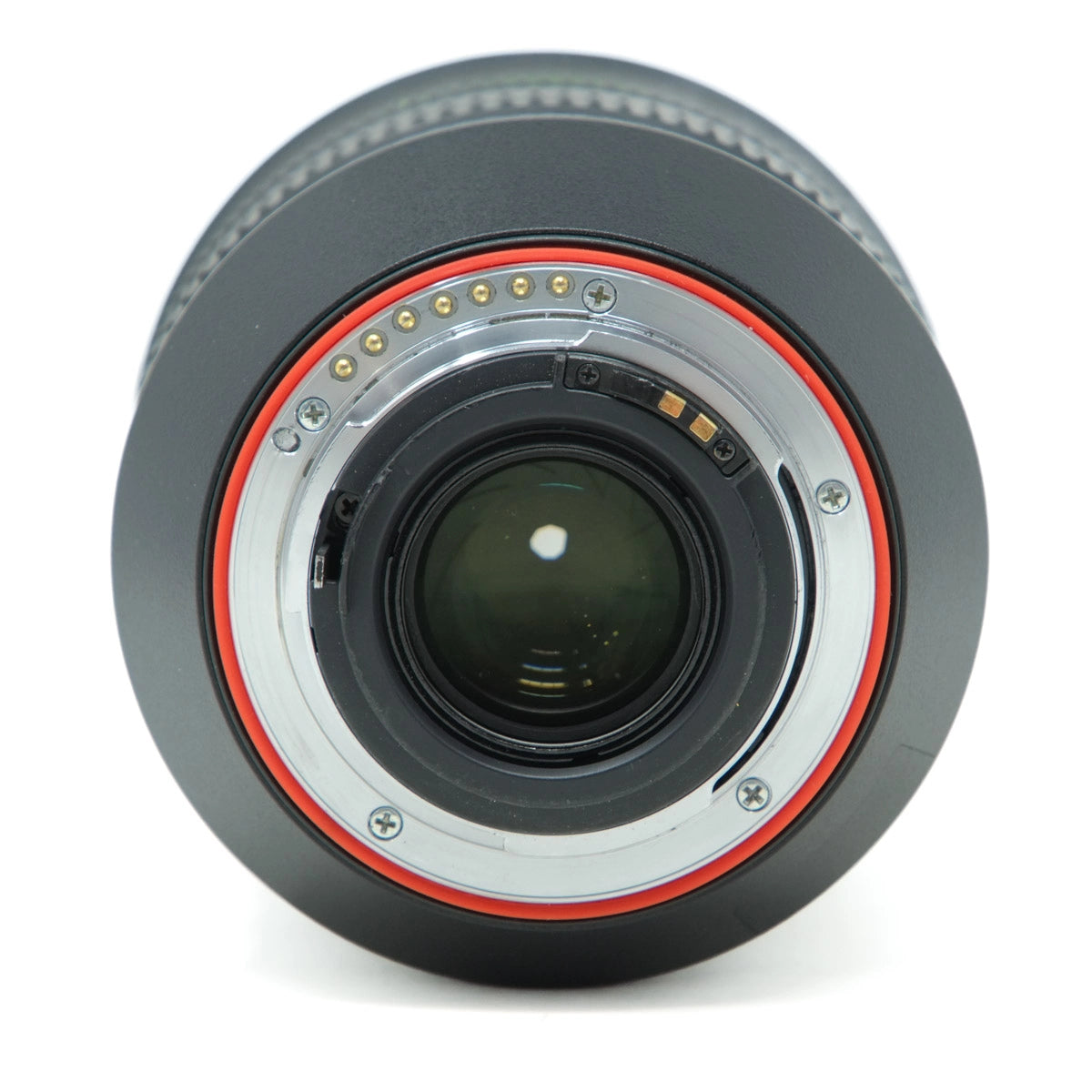 Camera lens with red and silver accents on a white background