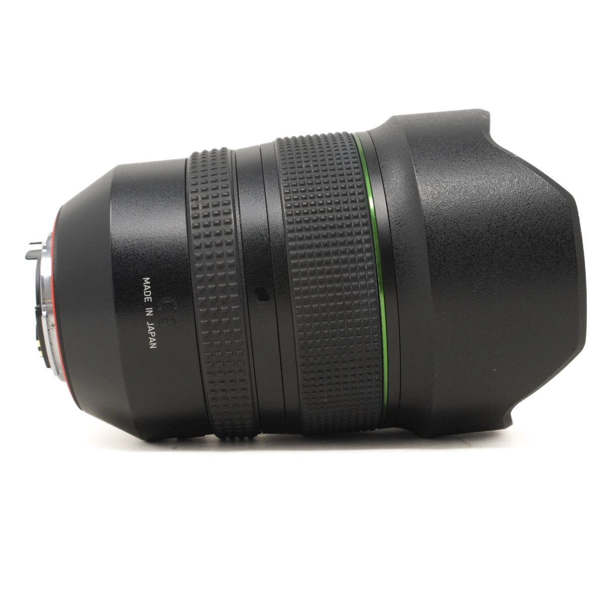 Camera lens with 'Made in Japan' text on a white background