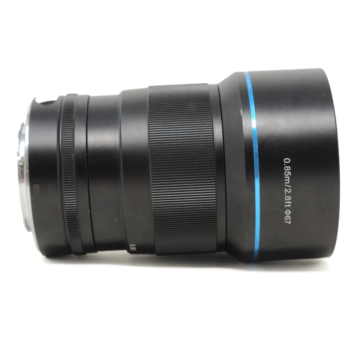 Black camera lens with text on a white background