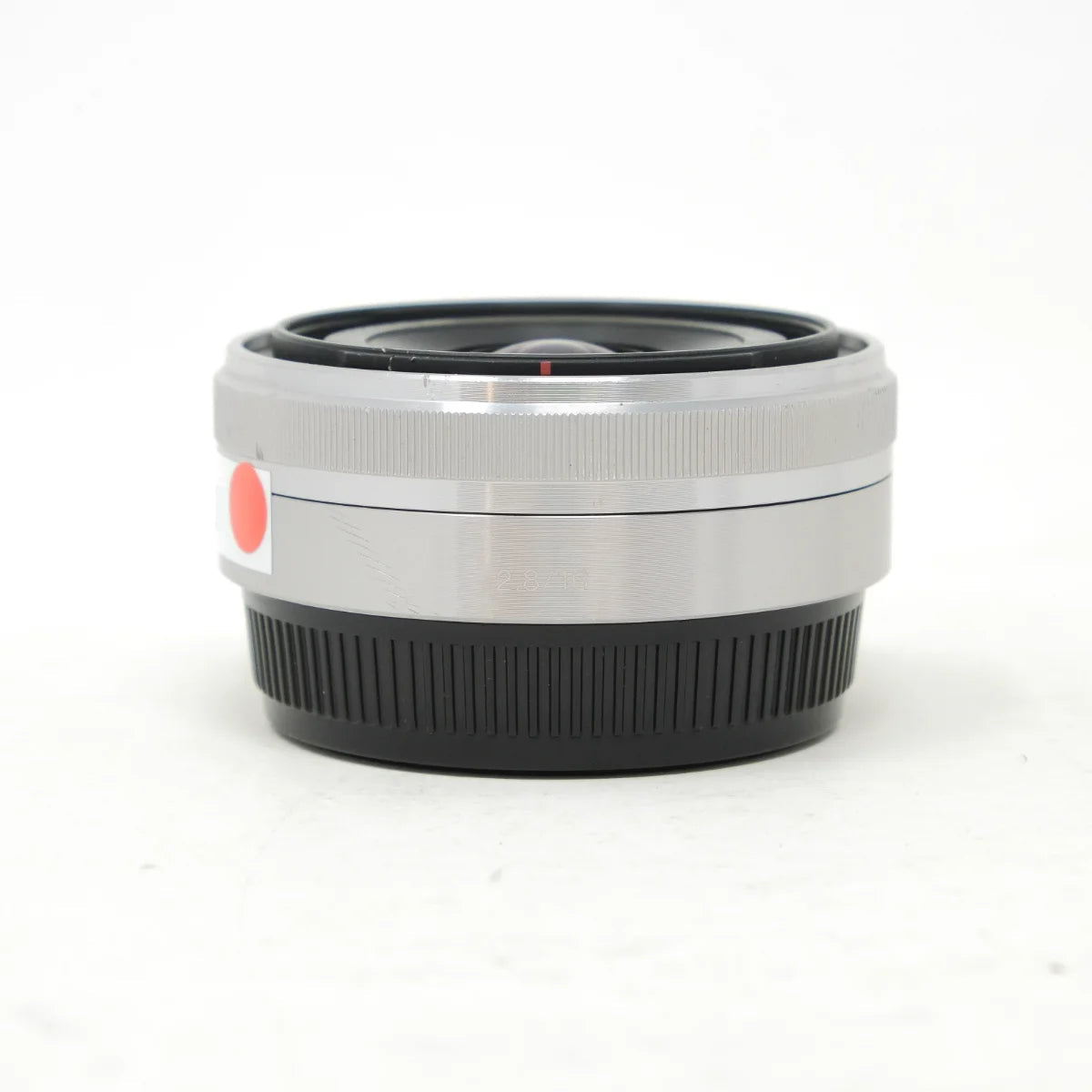Used Sony 16mm F2.8 Pancake Lens in Silver E Mount - front angle 