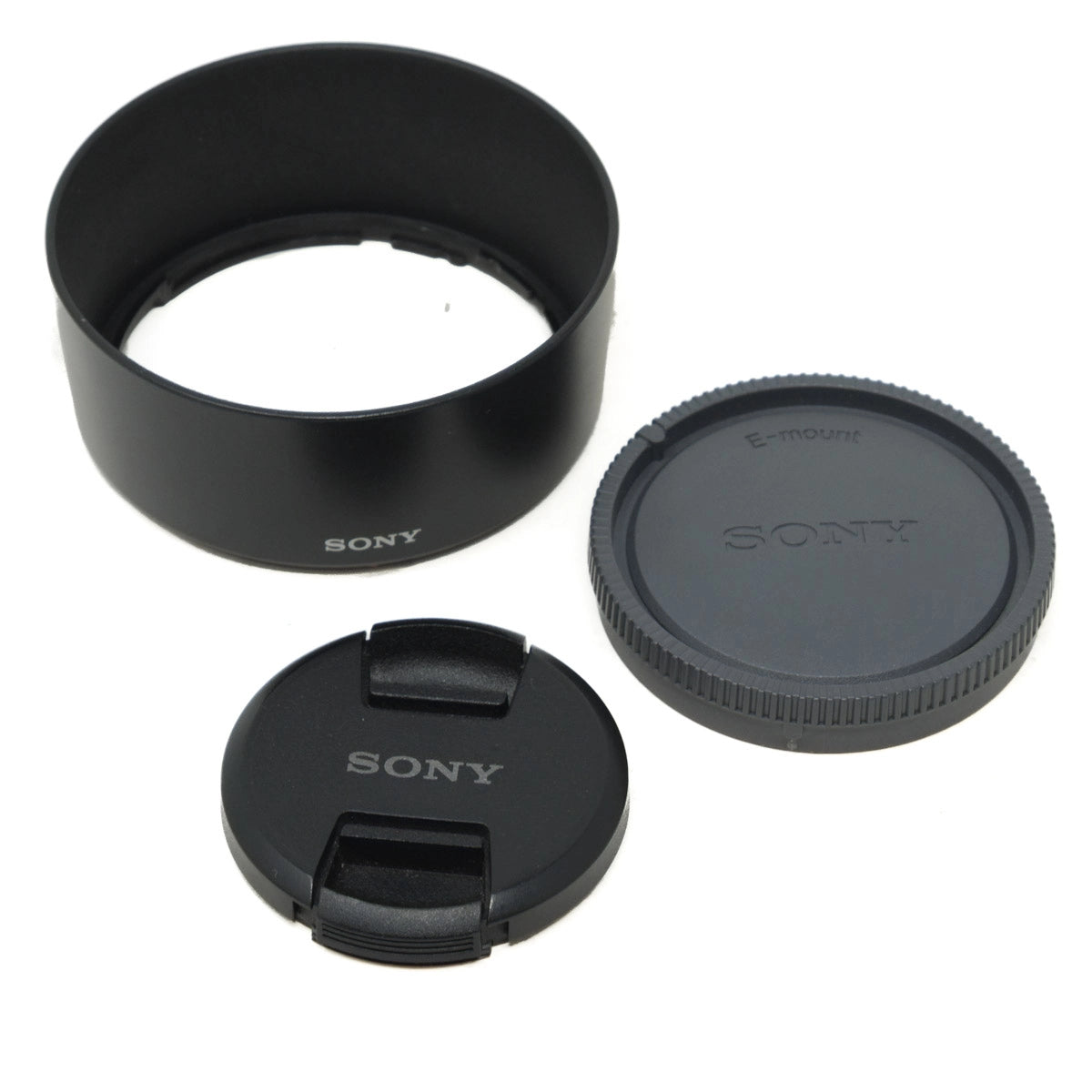 Sony lens hood and cap set on a white background