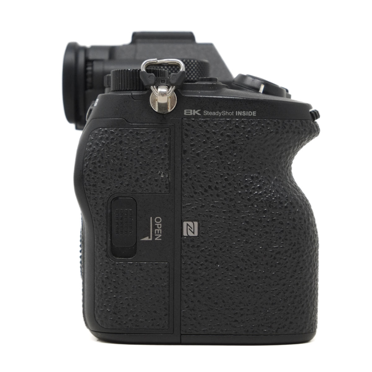 Black camera body with textured grip and visible brand logo on a white background