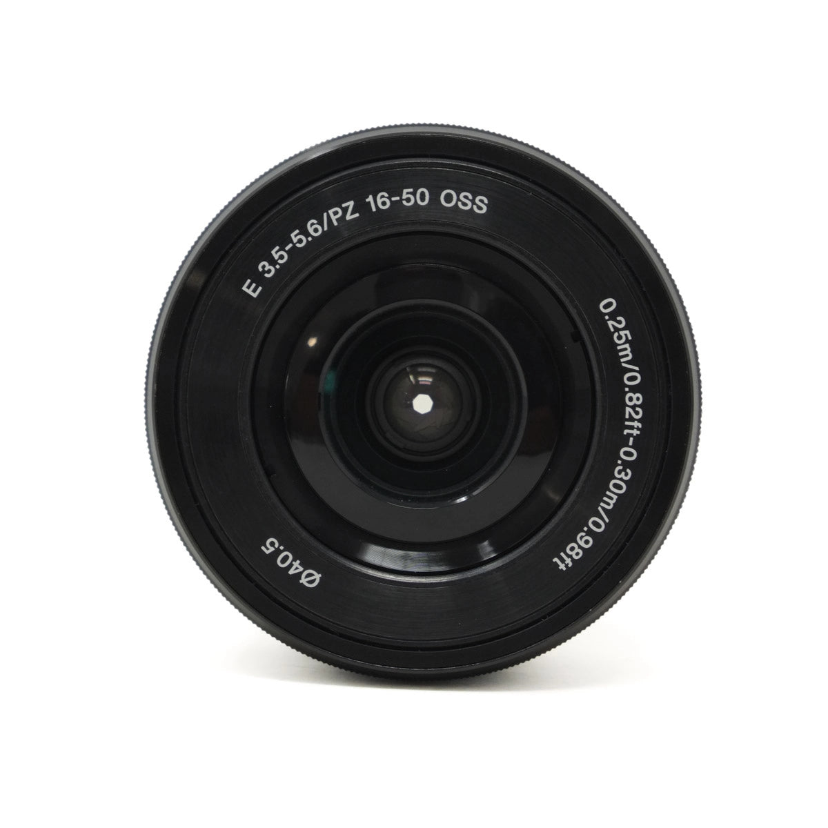 Black camera lens with text on a white background