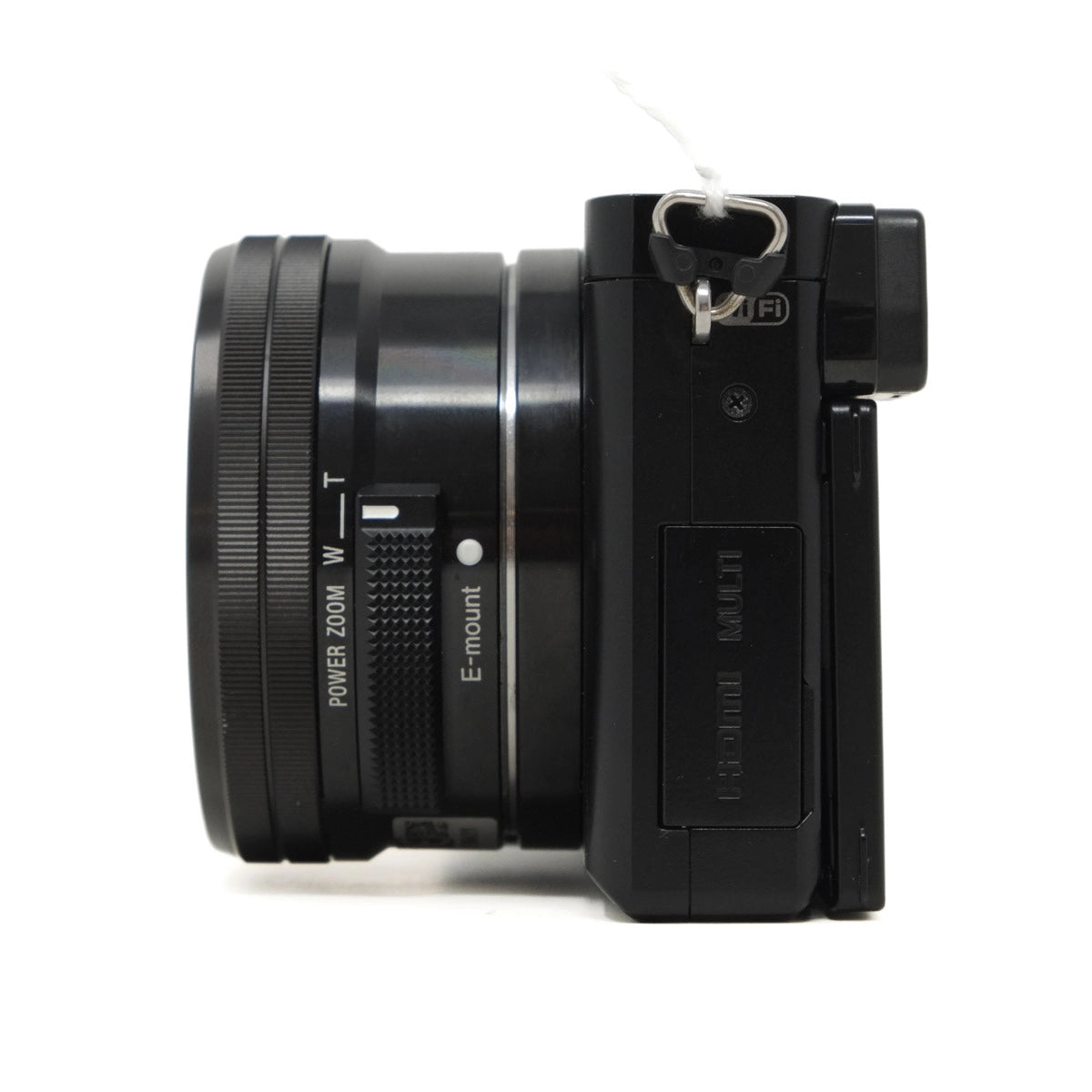 Black camera lens and body on a white background