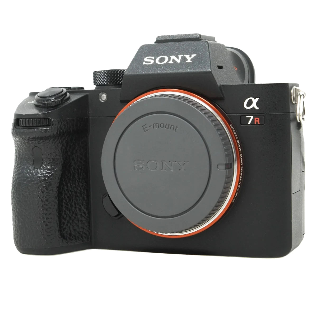 Sony Alpha 7R mirrorless camera body in black, shown from the front with the lens cap removed and an orange-red ring accent visible around the mount.