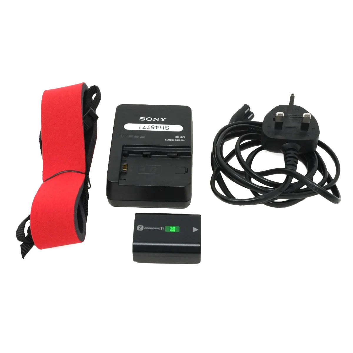 Sony SHAH45RZ battery charger kit including a red and black strap, a black battery charger unit, a Sony UK wall plug, and a rechargeable battery with green LED indicators, on a white background.