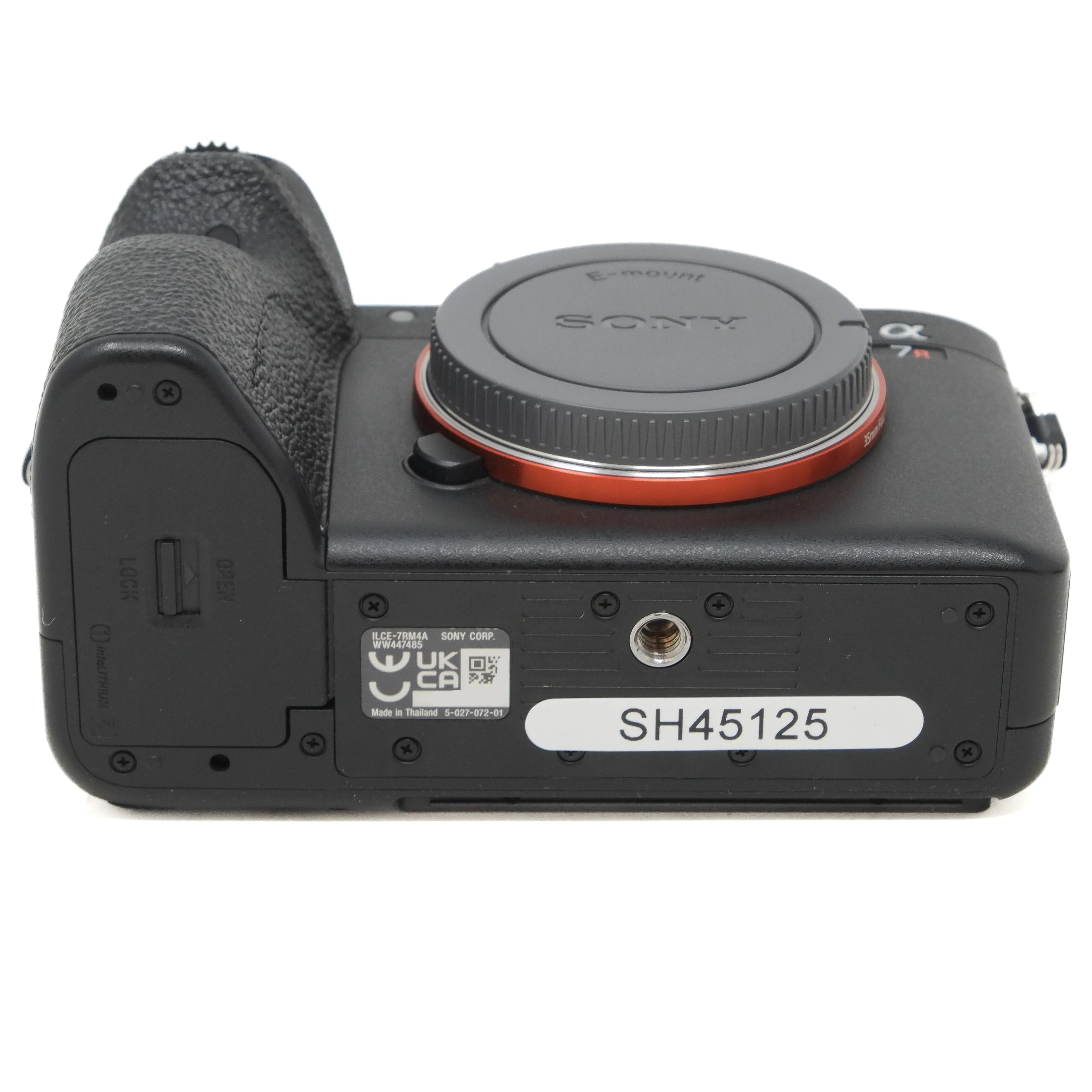 Sony camera body with body cap on a white background