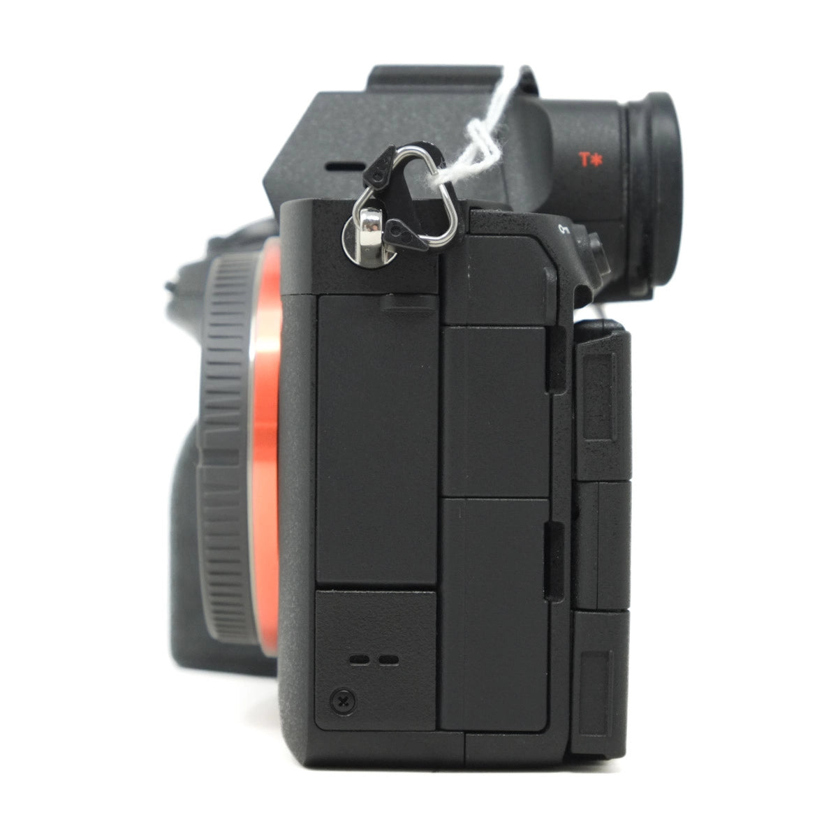 Camera body with body cap on a white background