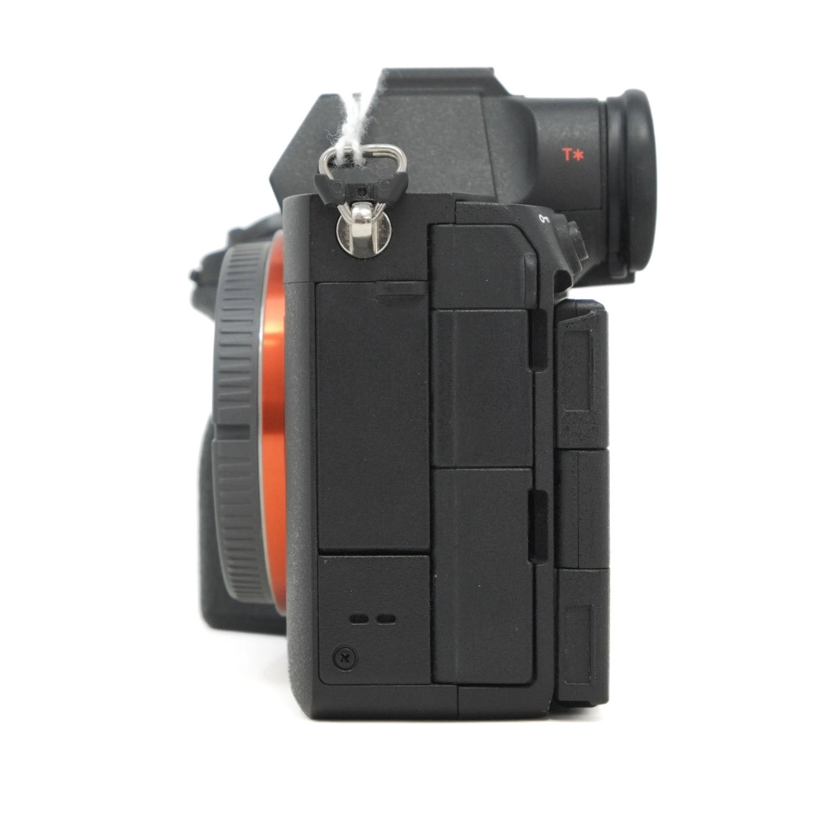Camera body with body cap on a white background