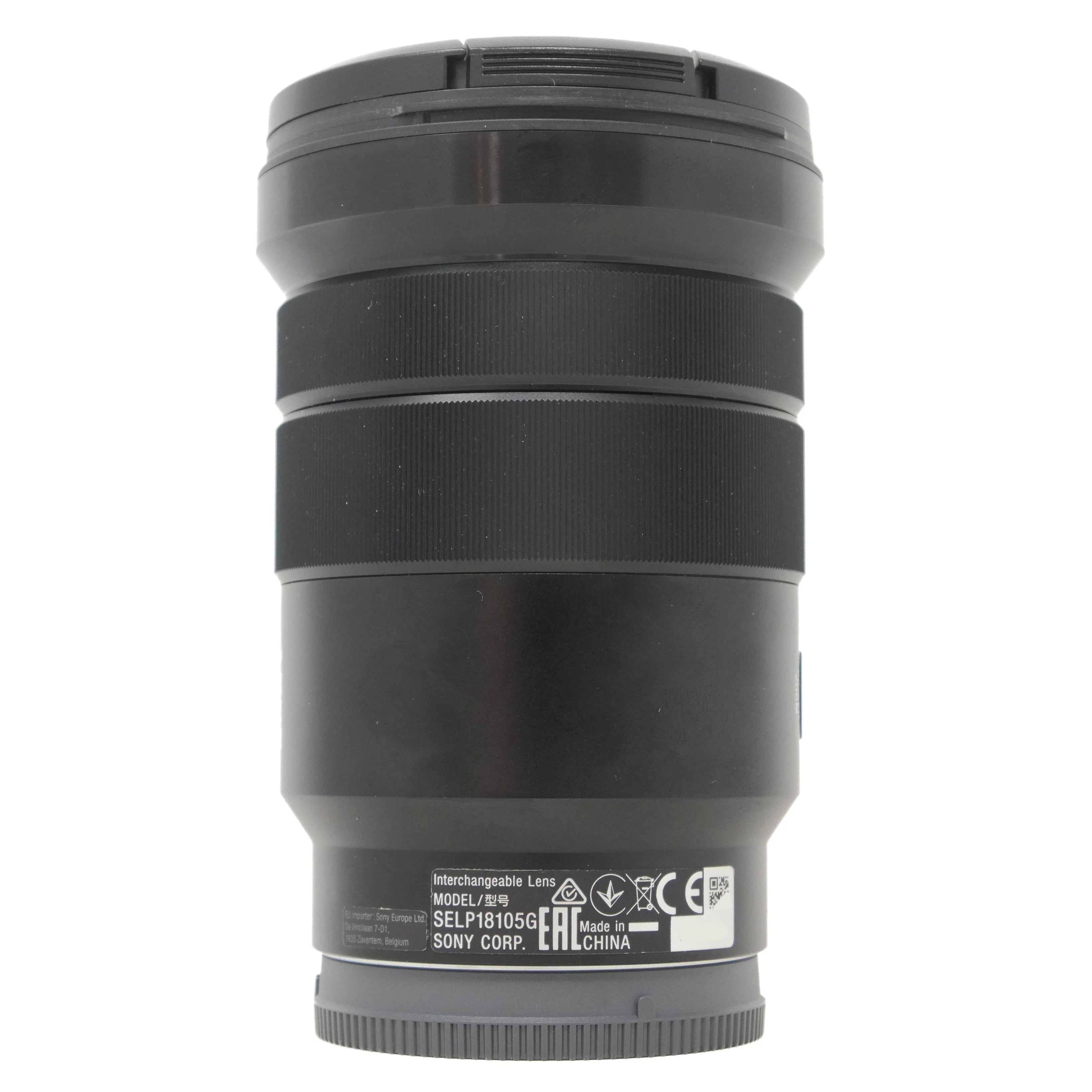 Black camera lens on a white background