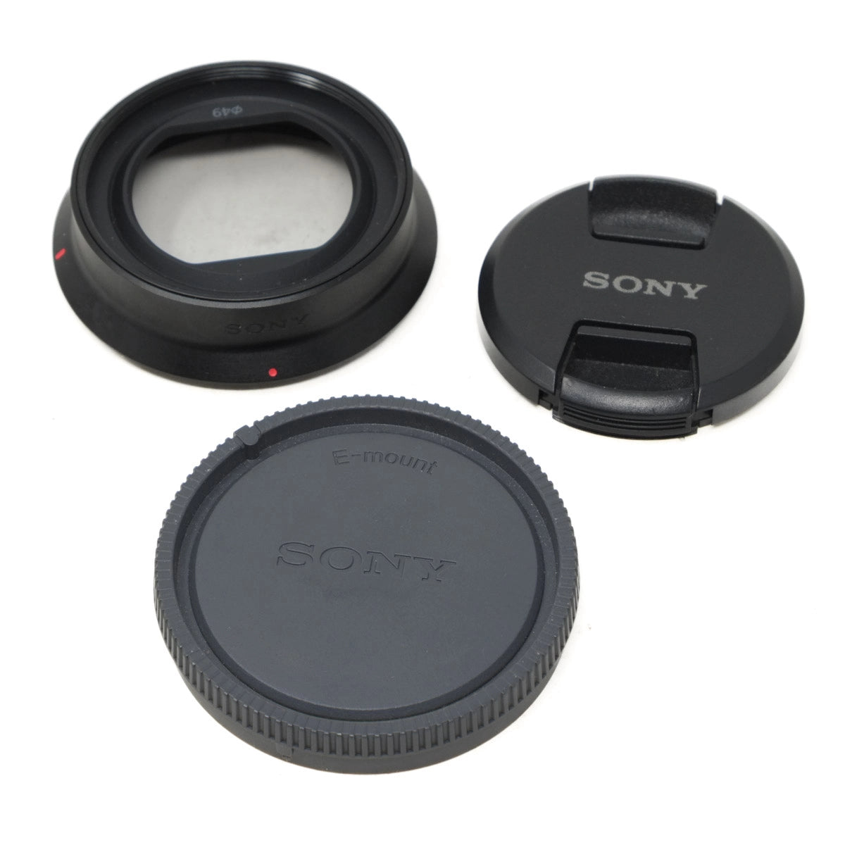 Sony camera lens components on a white background