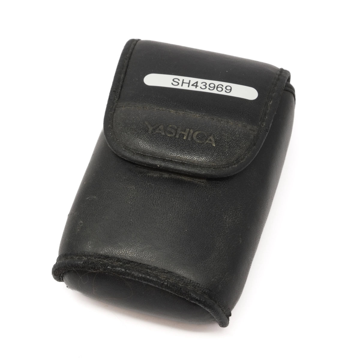 Black camera case with 'Yashica' branding on a white background