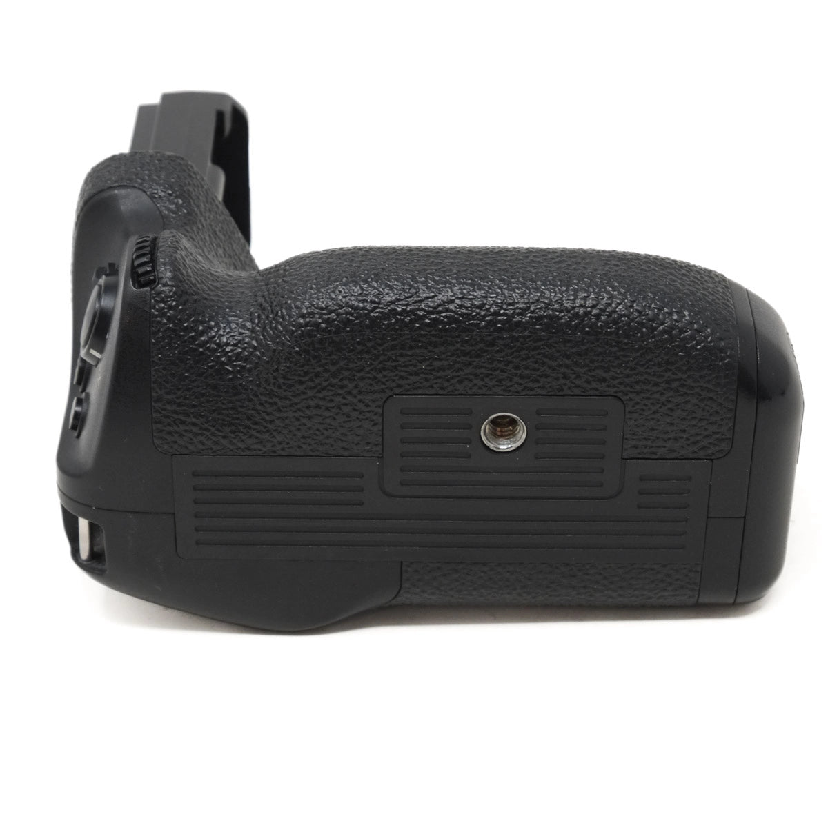 Black camera battery grip on a white background