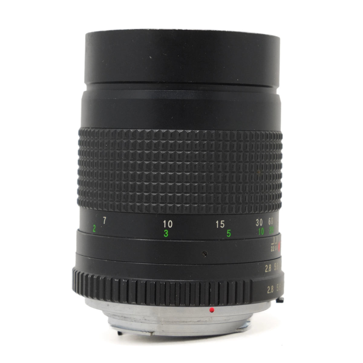 Camera lens with focus scale on a white background
