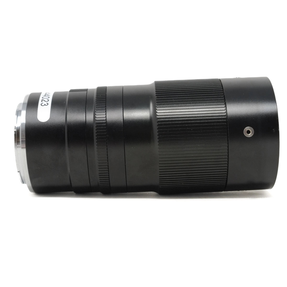 Black camera lens on a white background