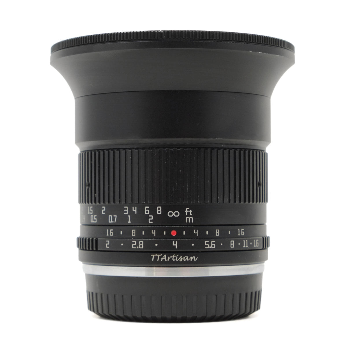 Black camera lens with focus scale on a white background