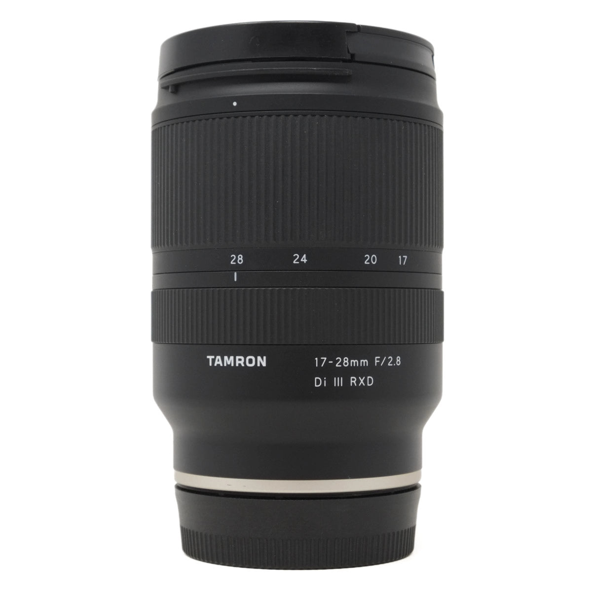 Black camera lens with 'Tamron' branding on a white background