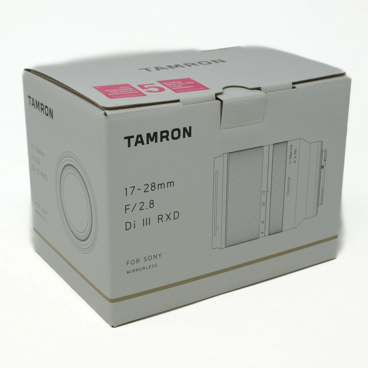 Tamron camera lens packaging box on a white background